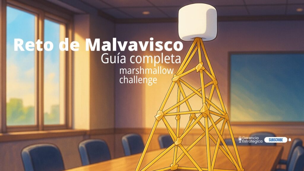 Torre alta de espaguetis del Reto del Malvavisco con un malvavisco en la cima, construida sobre una mesa en una sala de reuniones.